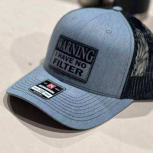 Warning No Filter patch on Richardson 112 Trucker Hat with bold typography