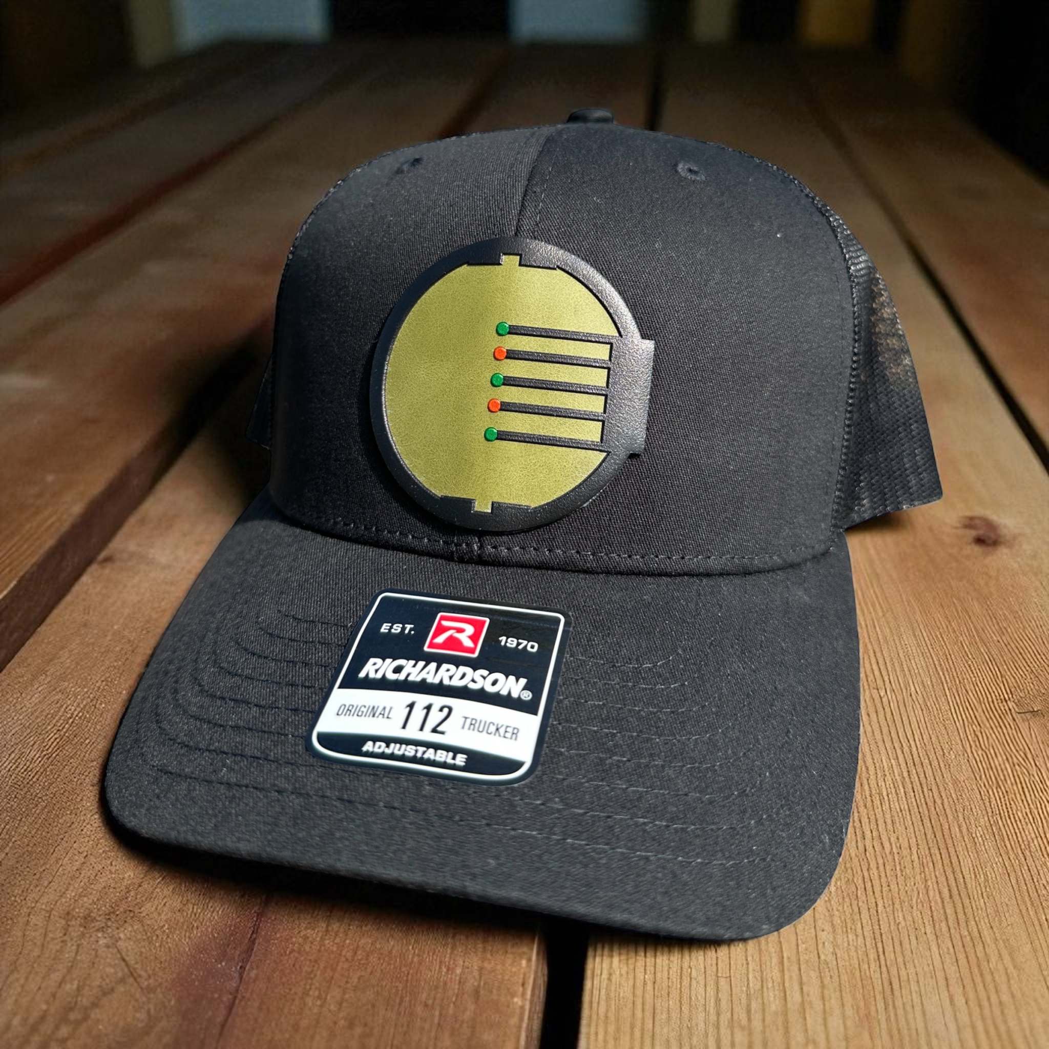 Black trucker Hat with a UV Printed Patch of a Bow Sight for Shooter Club Hat