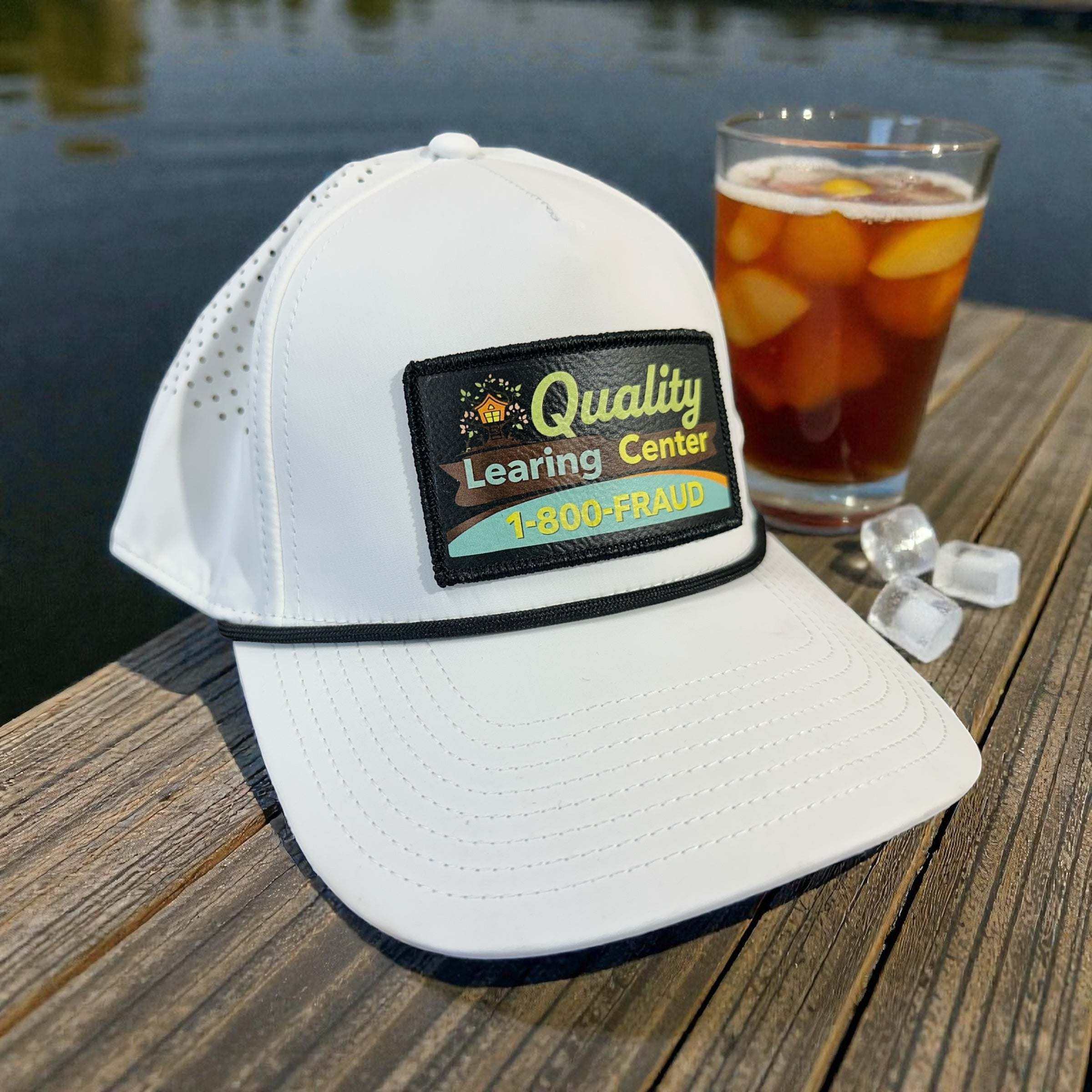 Quality Learing Center Branded Bills snapback hat with UV printed leather patch and merrowed edge