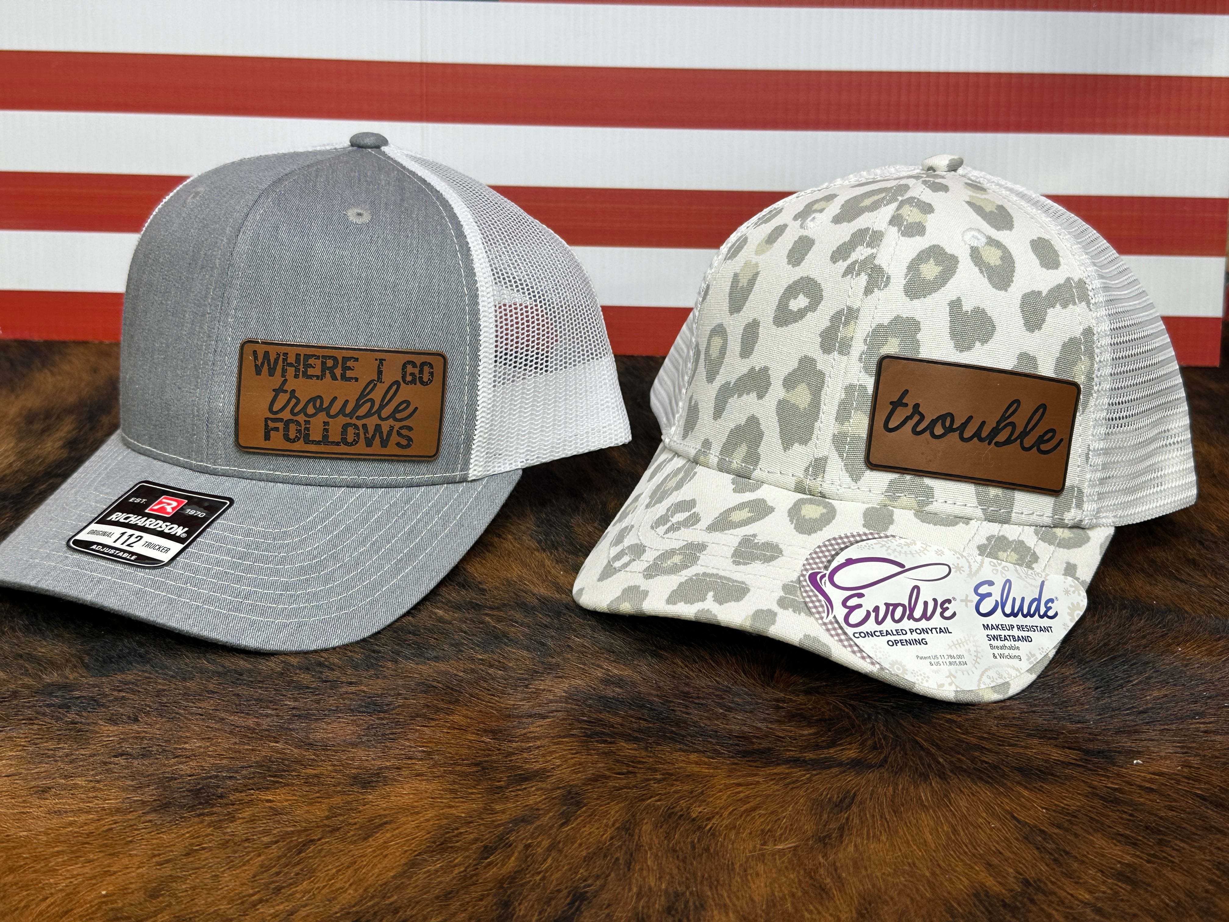 Trouble Follows Hat set with Richardson 112 snapback and foam trucker hats, leopard print, adjustable fit for couples