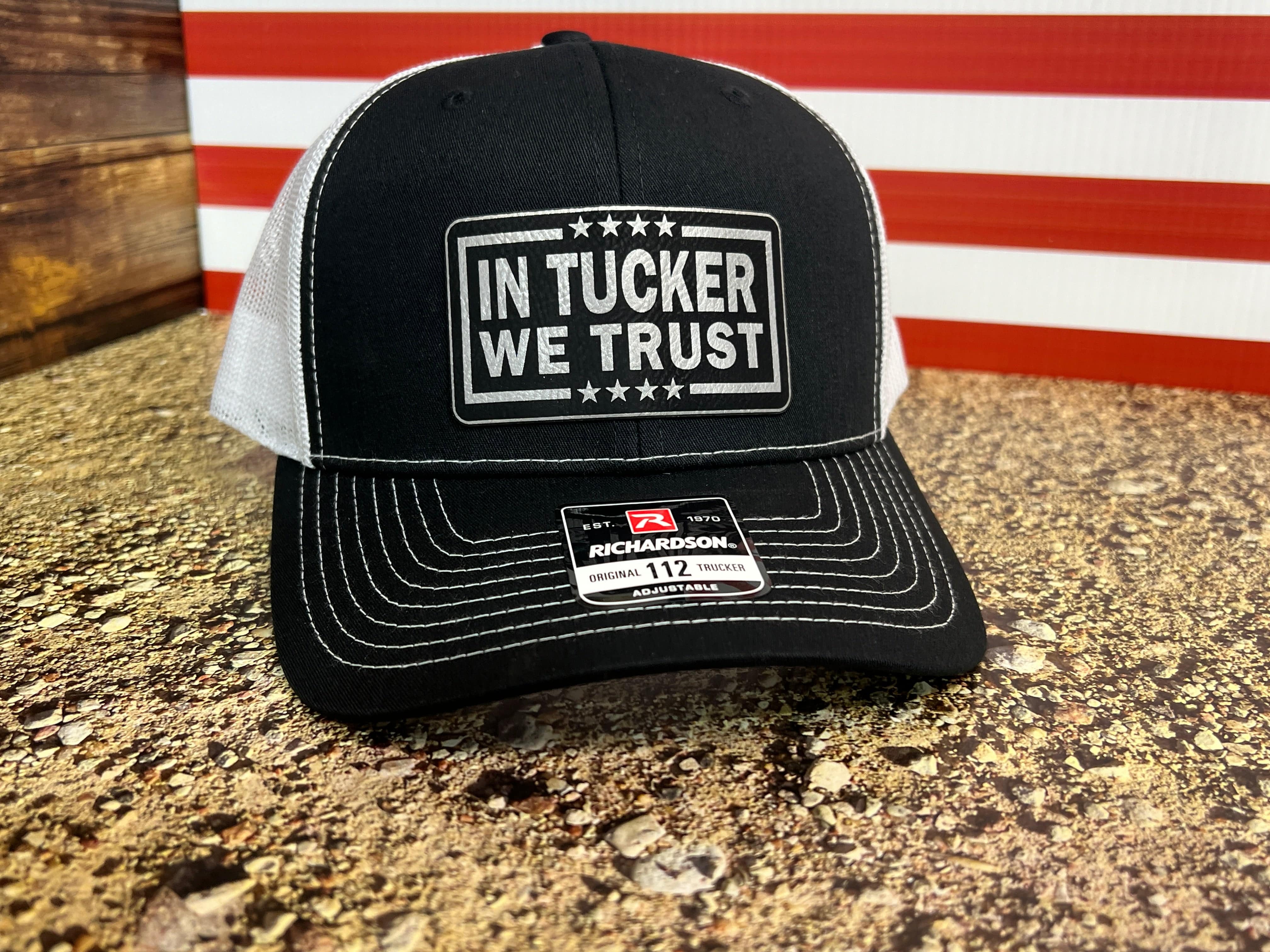 In Tucker We Trust Hat with Laser Engraved Premium Leatherette Patch on a Richardson 112 Trucker Hat. - F5 Custom Designs