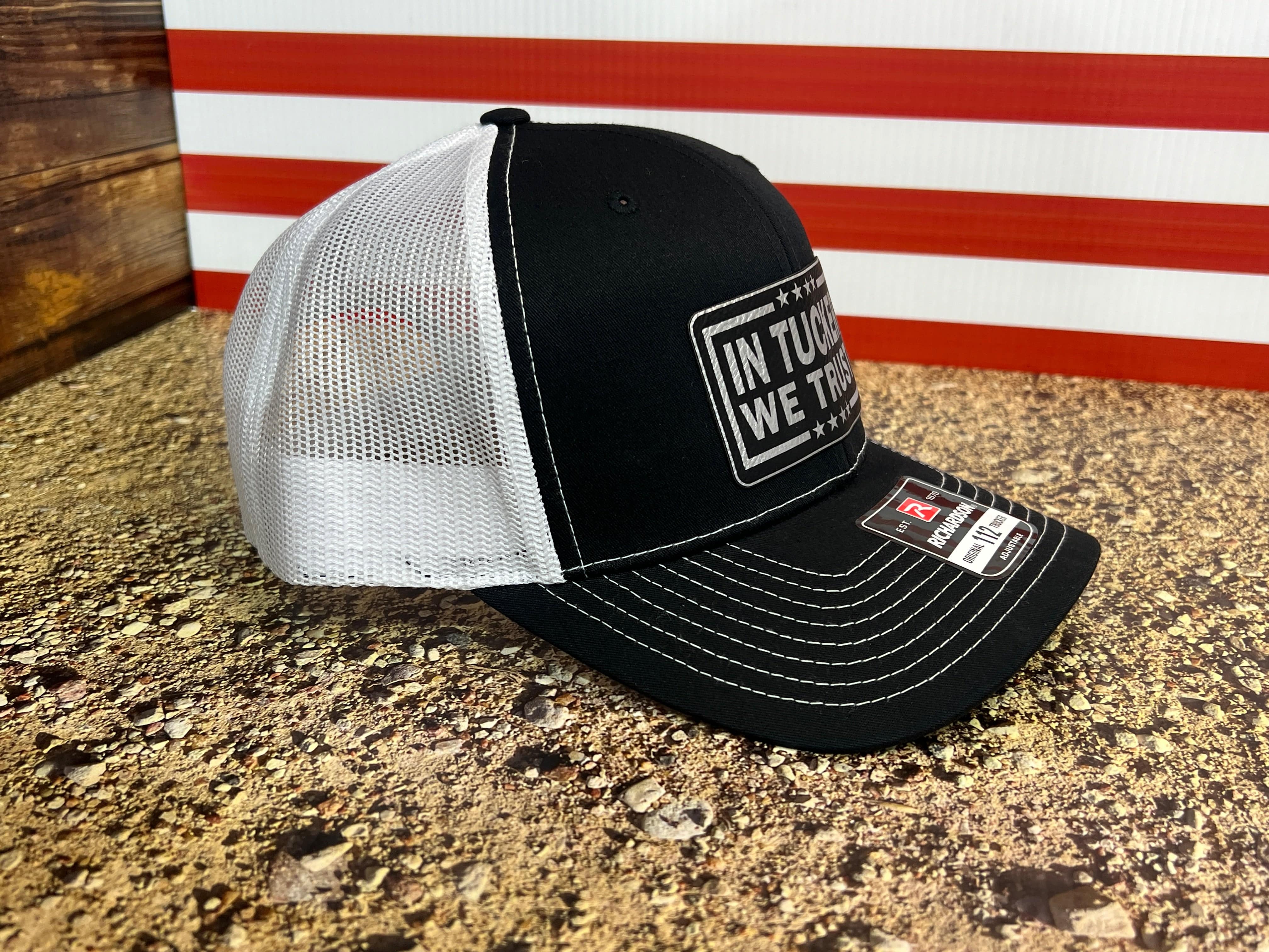 In Tucker We Trust Hat with Laser Engraved Premium Leatherette Patch on a Richardson 112 Trucker Hat. - F5 Custom Designs