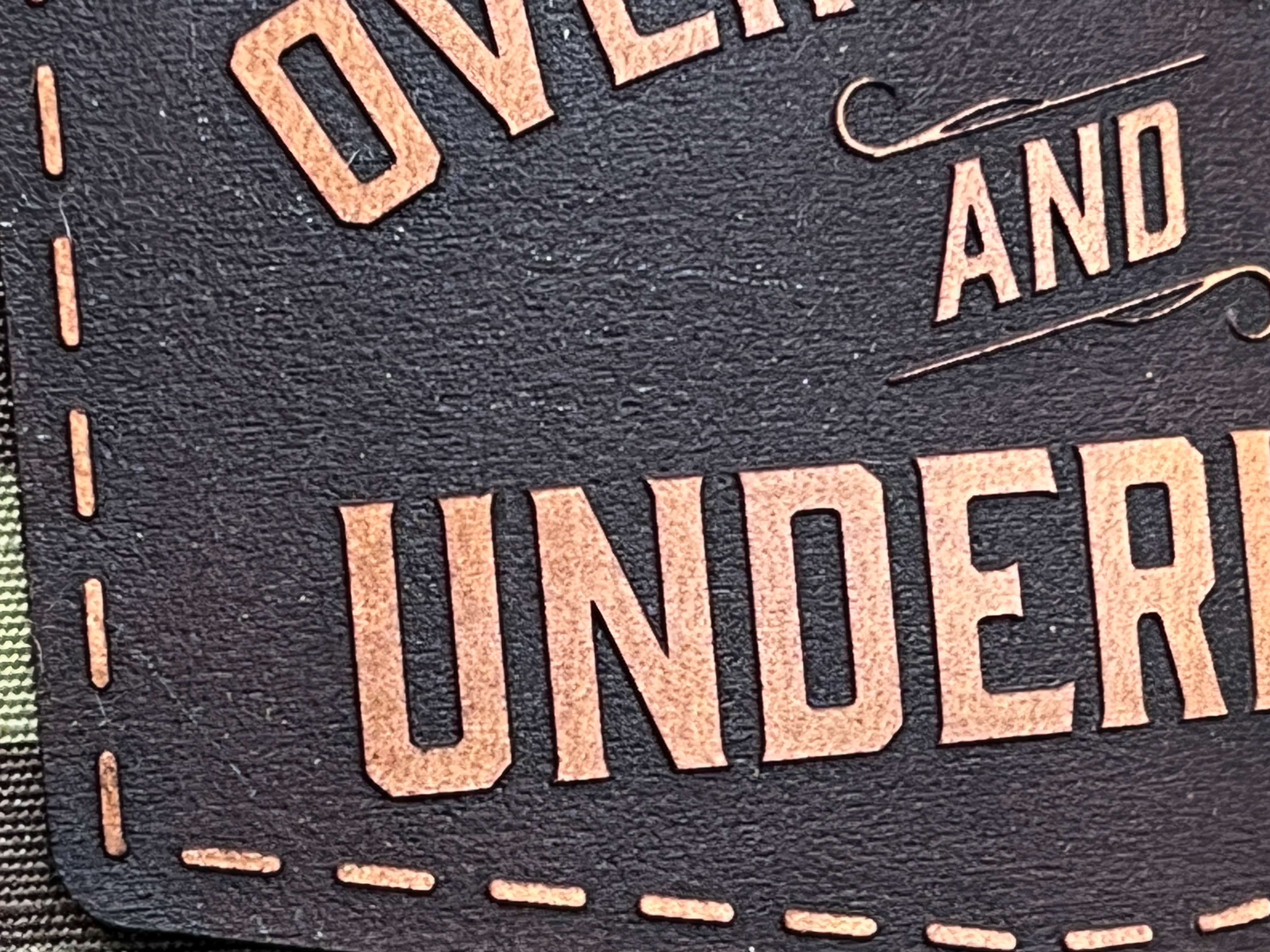 Genuine Leather Overworked Underlaid Hat Laser Engraved Genuine Leather Patch on a Richardson 862 Camo Hat. - F5 Custom Designs