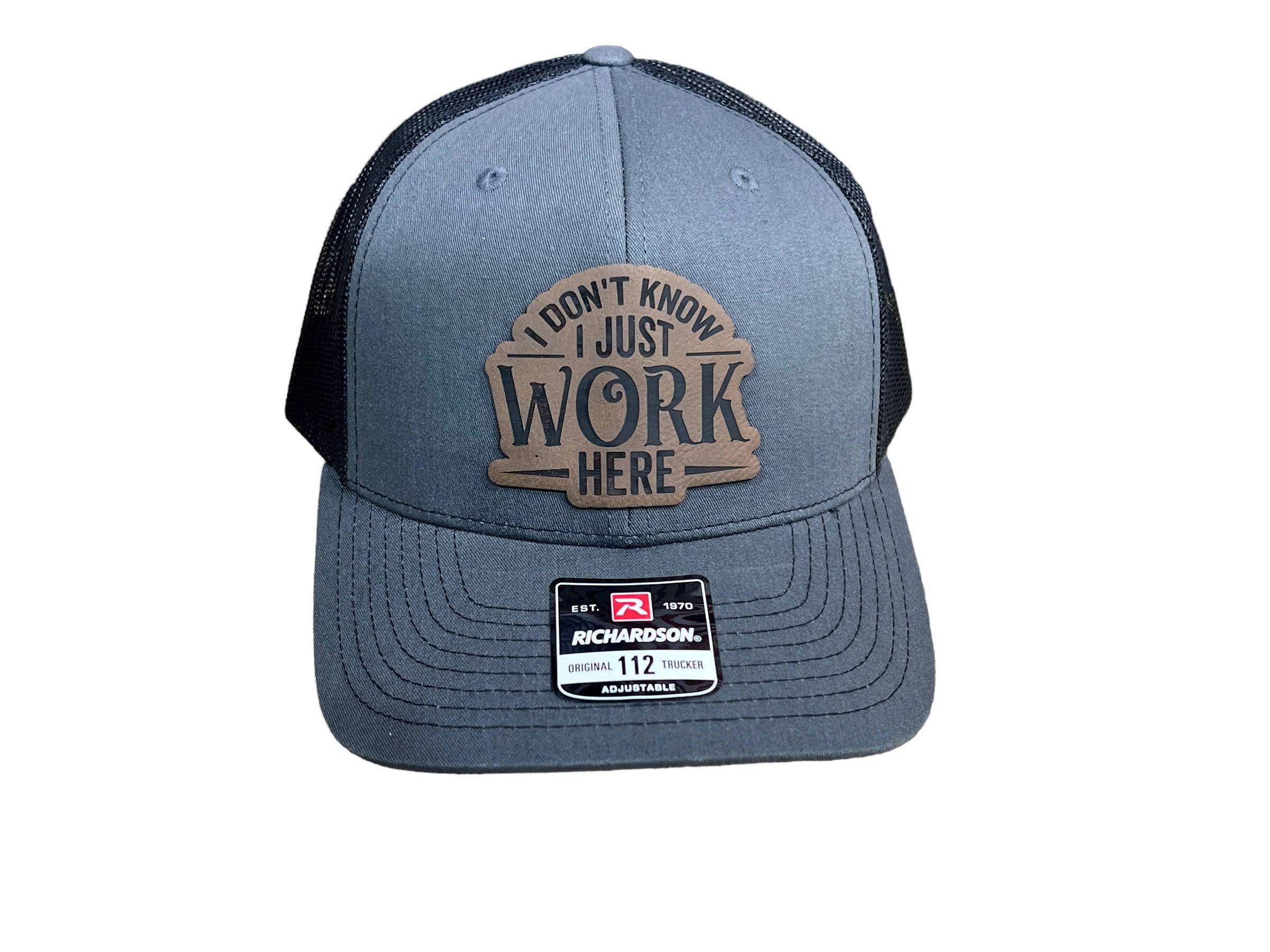I don’t know. I just work here hat with premium Leatherette Patch on Richardson 112 Trucker Hat featuring adjustable snapback and breathable mesh back.