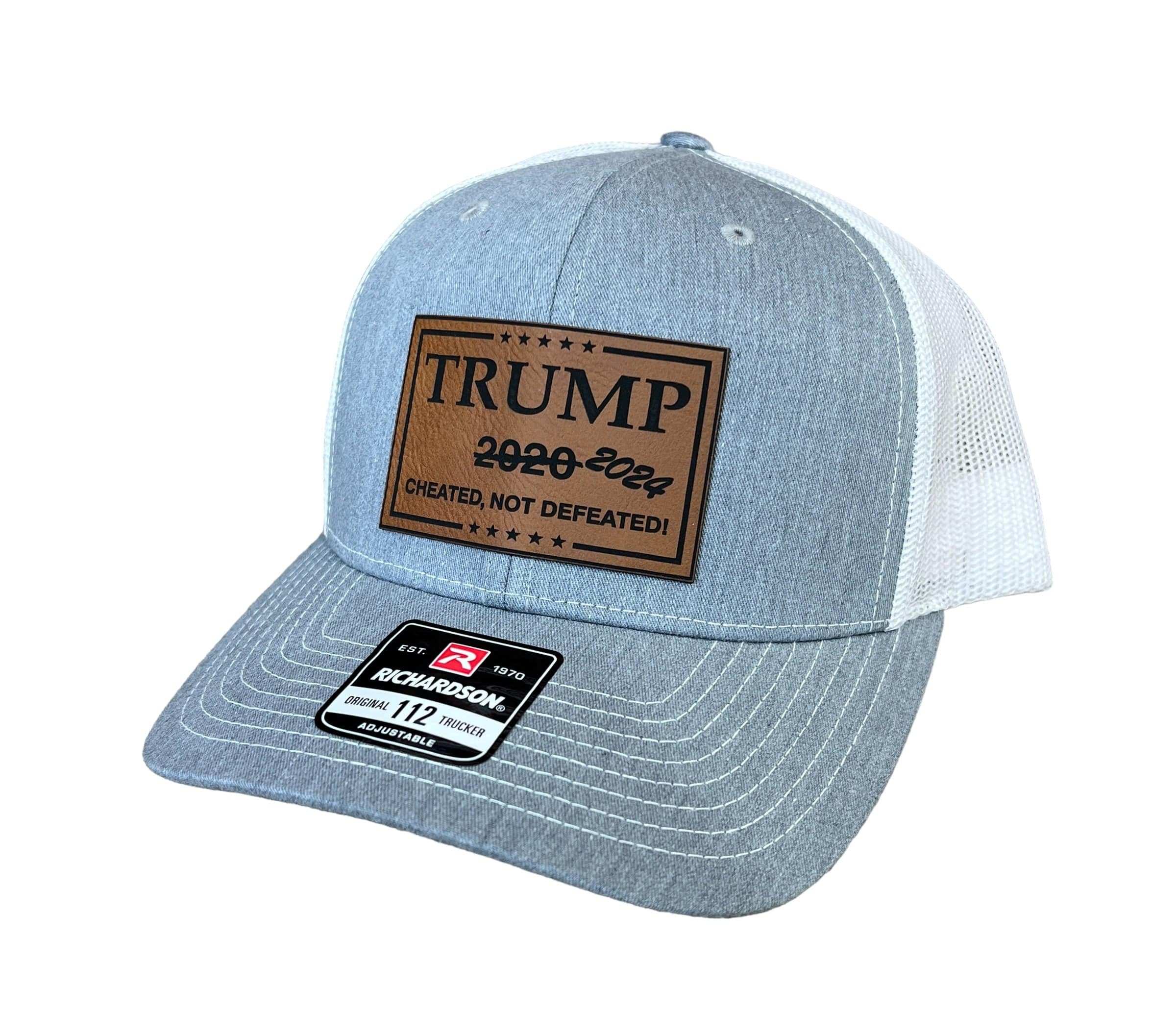 Cheated Not Defeated Trump 2024 trucker hat with laser engraved leatherette patch on Richardson 112 adjustable snapback