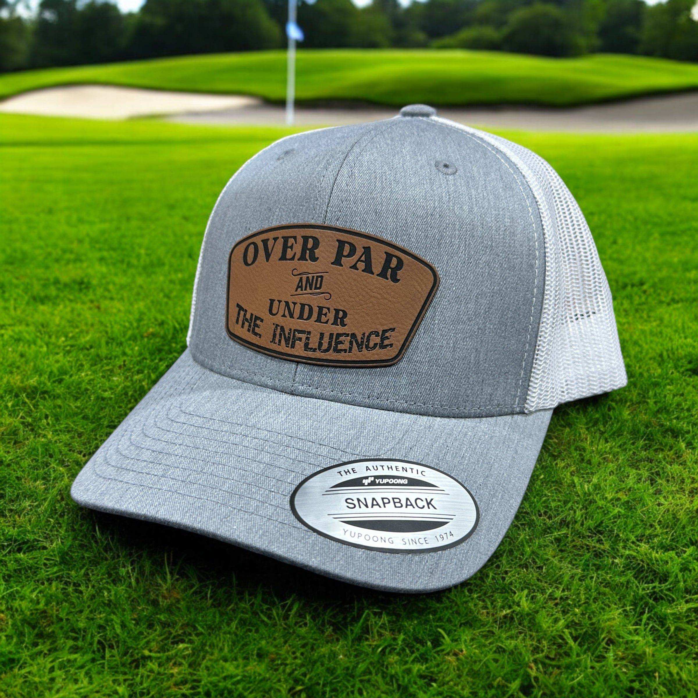 Over Par Under the Influence golf trucker hat with premium leatherette patch and adjustable snapback