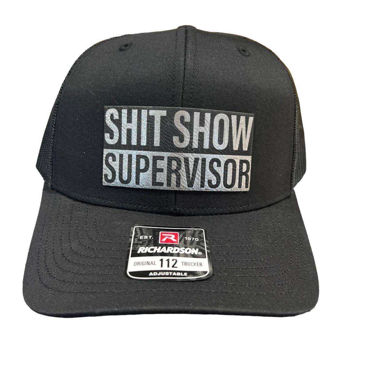 Shit Show Supervisor leatherette patch on Richardson 112 trucker hat with adjustable snapback and mesh panels