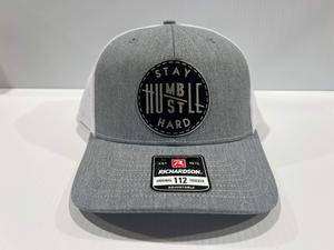Stay Humble Hustle Hard Hat Richardson 112 Trucker Hat with adjustable snapback and premium leatherette patch