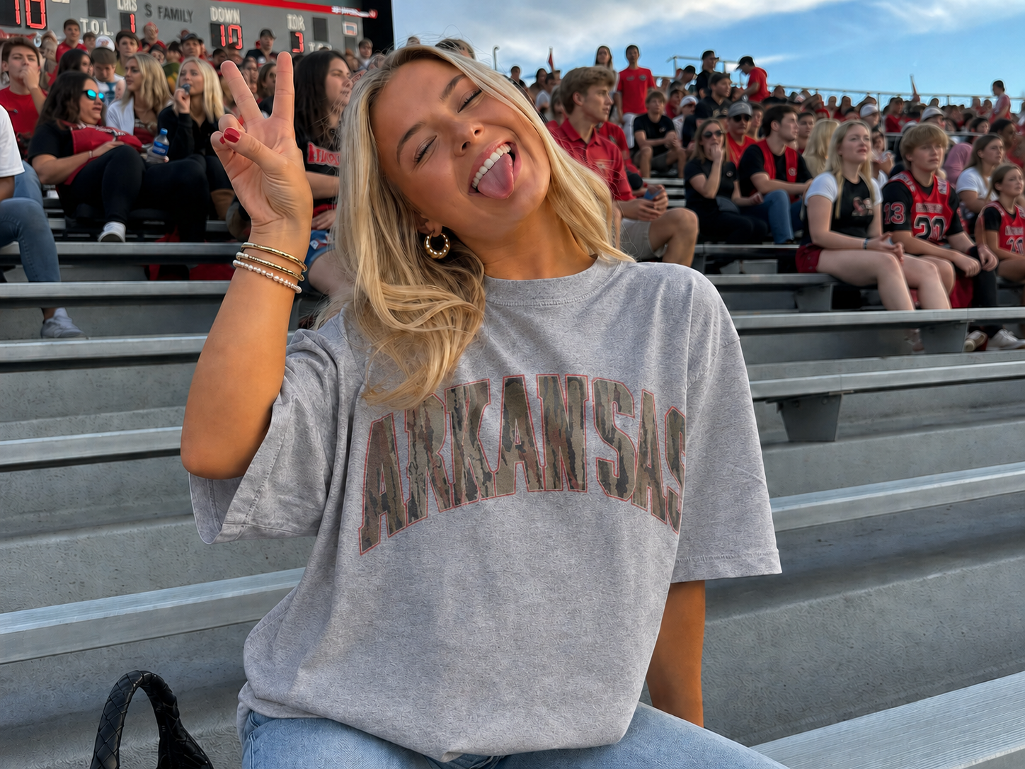 Sport grey camo Oklahoma team name T-shirt worn at a football stadium