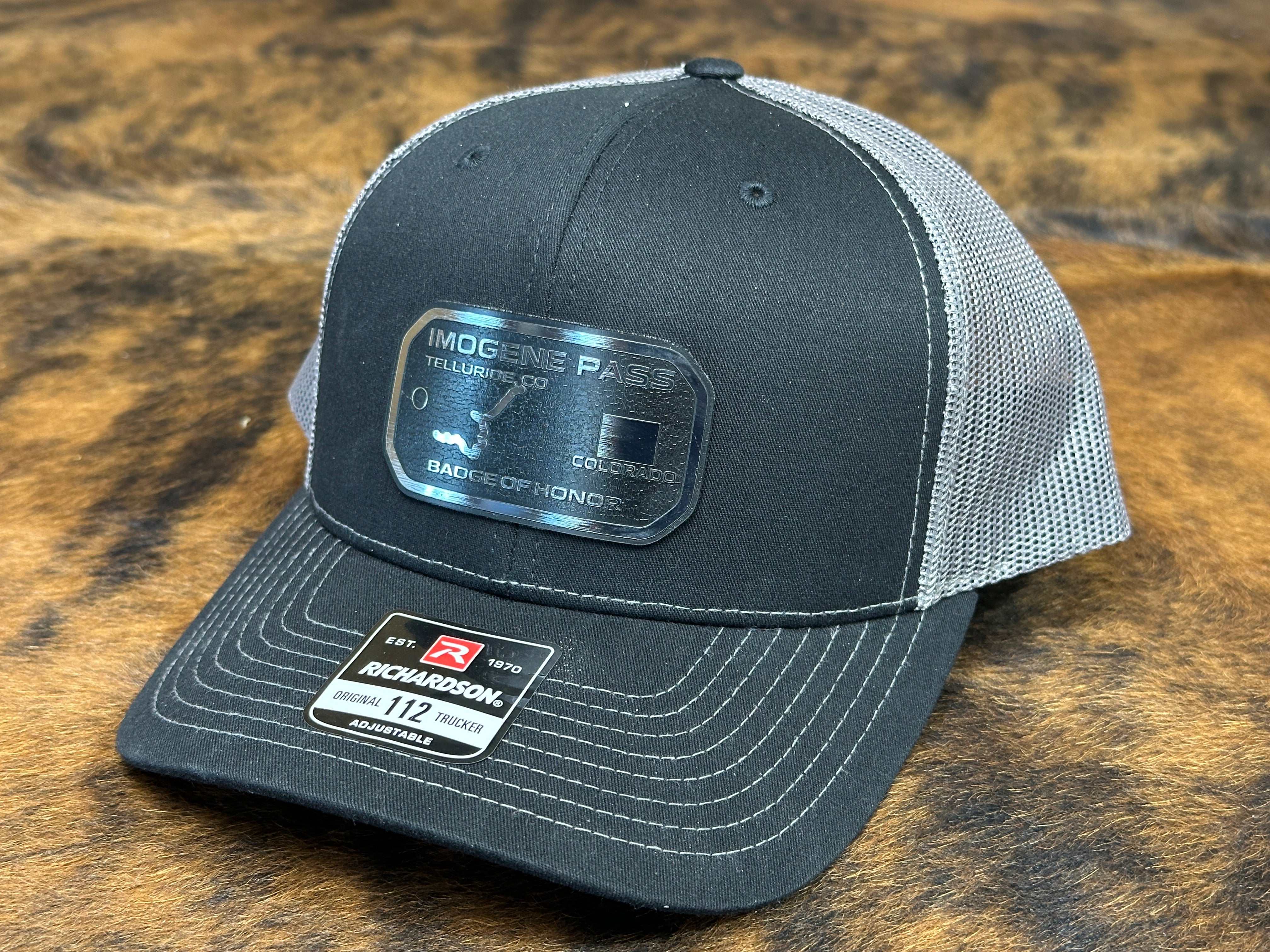 Colorful UV printed patches on hats showcasing vivid 3D detail and texture build