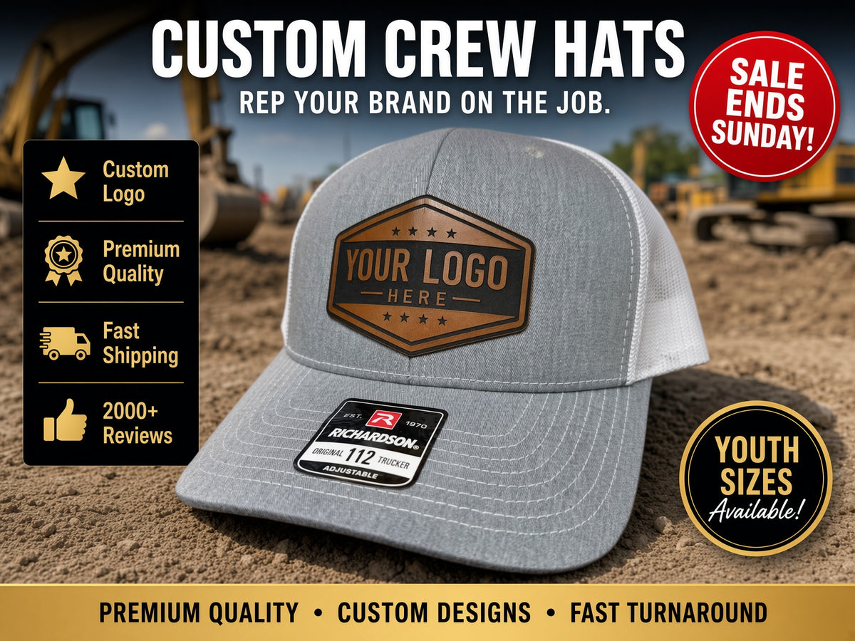 A gray mesh-back trucker hat with a brown embroidered front patch reading 'YOUR LOGO HERE' is shown in a construction-site setting. Large text at the top says 'CUSTOM CREW HATS' and includes sale and youth-size callouts.