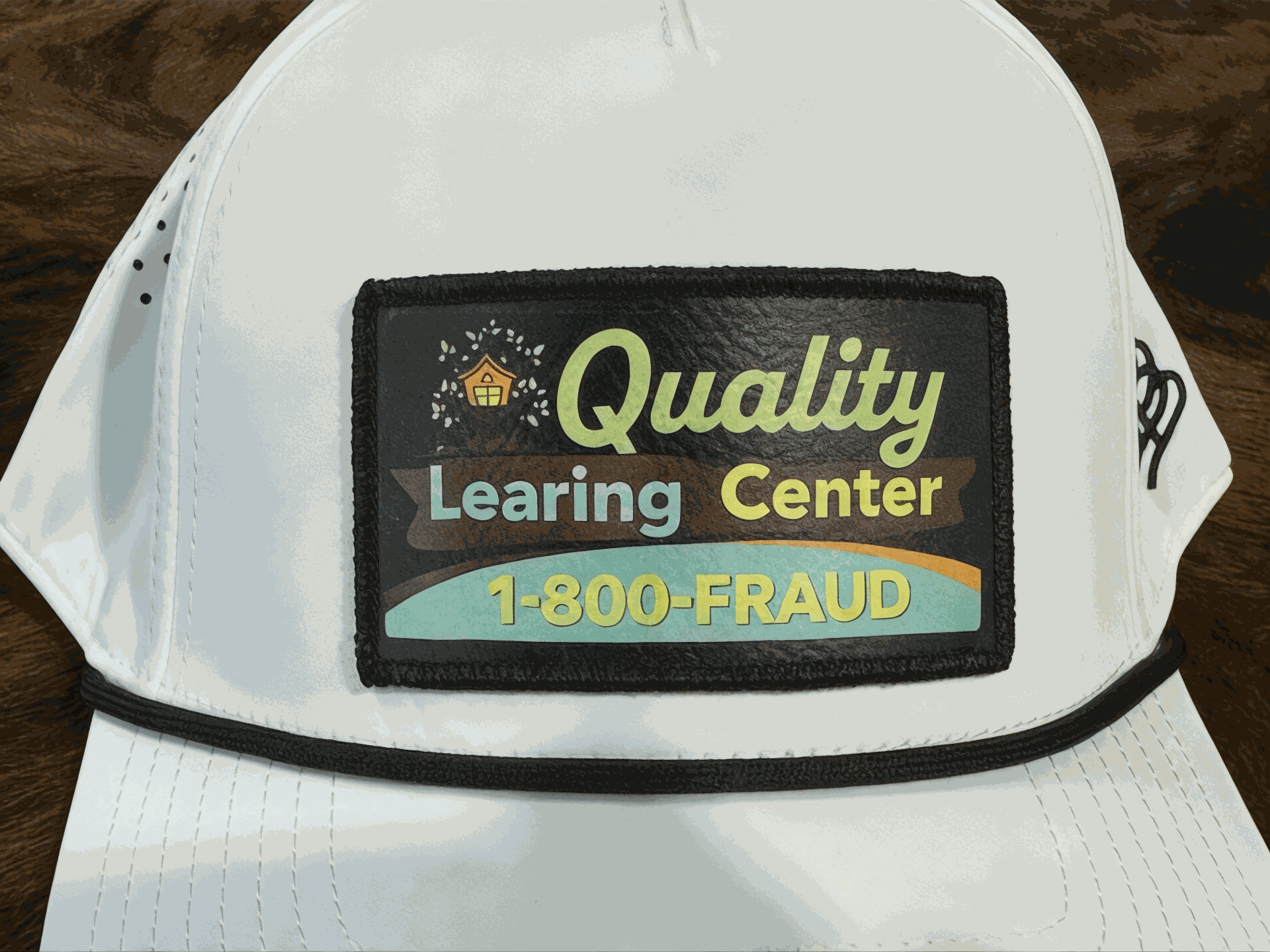 Quality Learning Center Branded Bills Hat with UV printed leather patch and adjustable snapback
