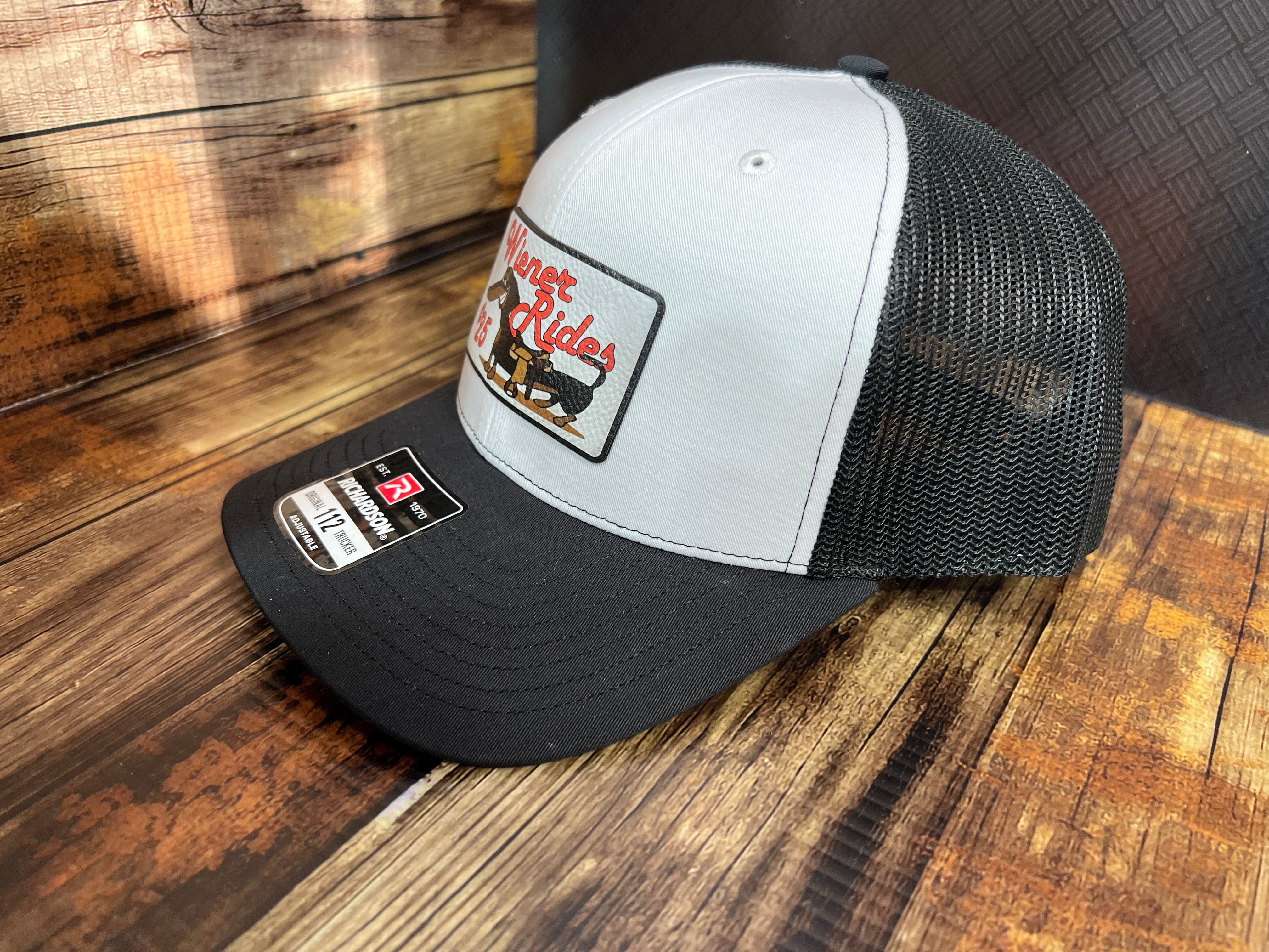 Wiener Rides Patch Hat with a UV Printed Premium Leatherette Patch on a Richardson 112 Trucker Hat - F5 Custom Designs